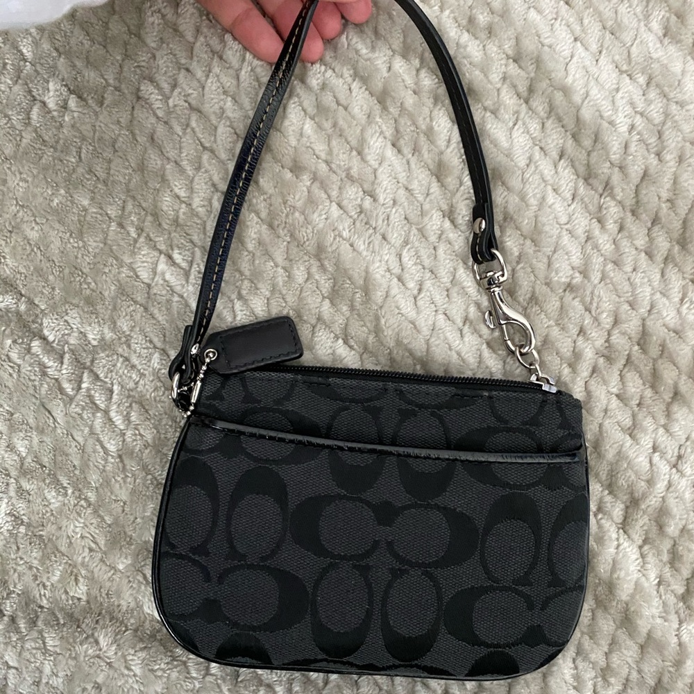 Tiny coach wristlet